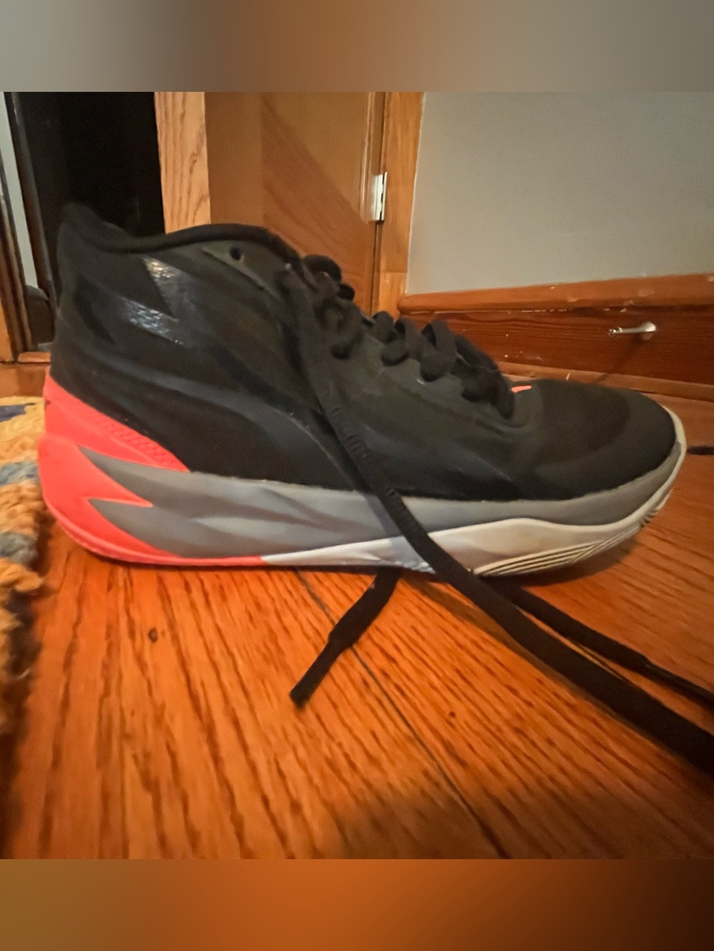 M.E.L.O.  Black Athletic Sneaker with Coral Heel Accent